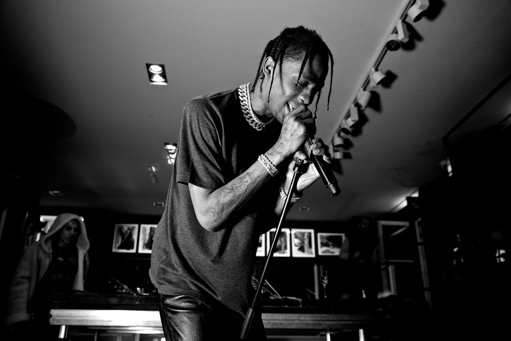 Travis Scott celebrates Saint Laurent vinyl collaboration, produced by Flaunt and 12on12, with performance at Colette